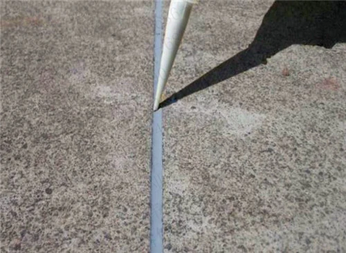 Filling cracks with concrete joint sealant