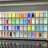 Showroom display wall featuring a diverse collection of colorful laminated glass samples using EVA Film for architectural design.